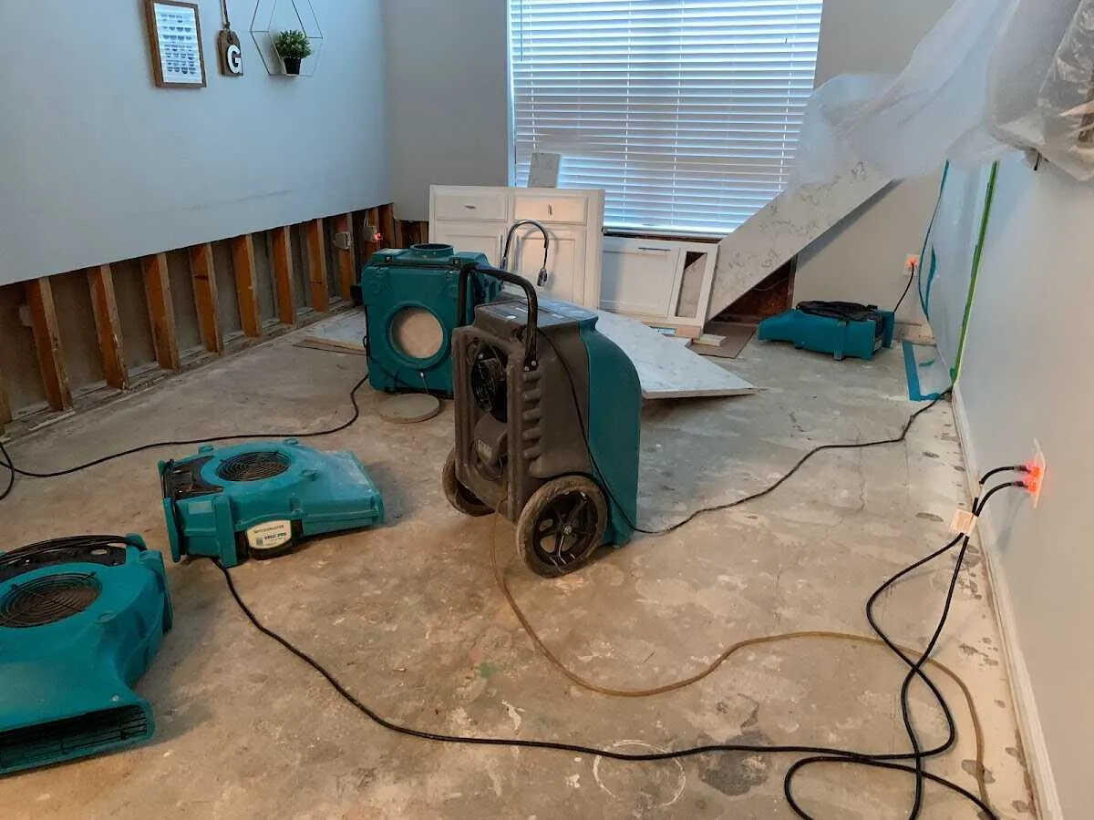 Dehumidifier in flood-cut room for Water Damage Restoration in Aldine